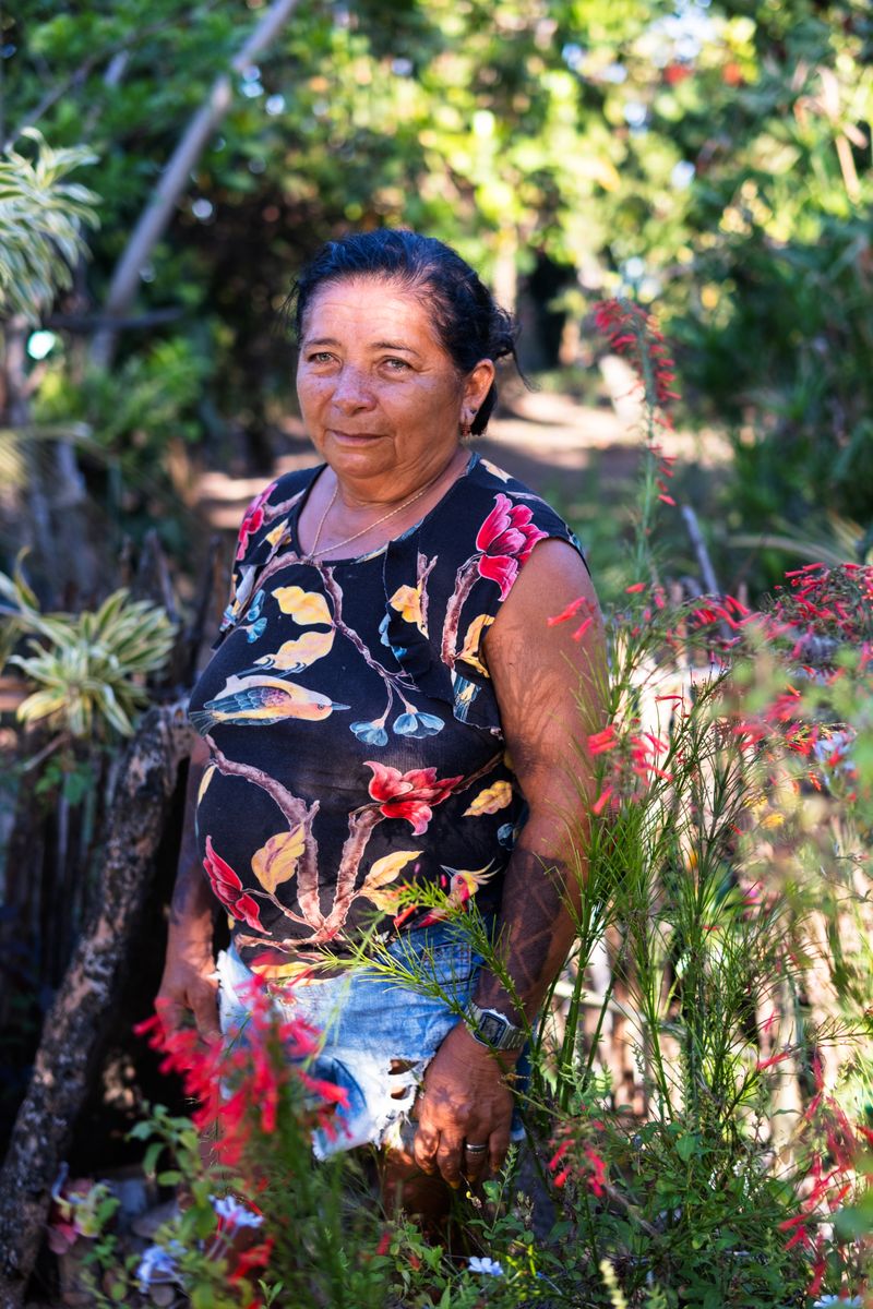 © Sabine van Wechem - Maria is in her favorite place in her garden, part of the larger surrounding land.