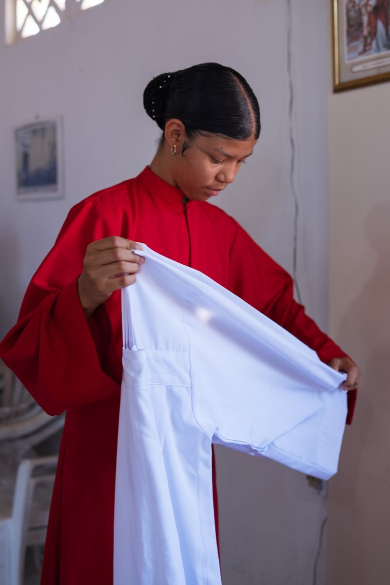 © Sabine van Wechem - A girl on Sunday, in church after the service.