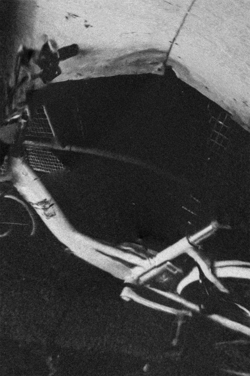 © Gene Chen - This is a white bicycle parked randomly in the alley. Nobody knows how long it has been here.