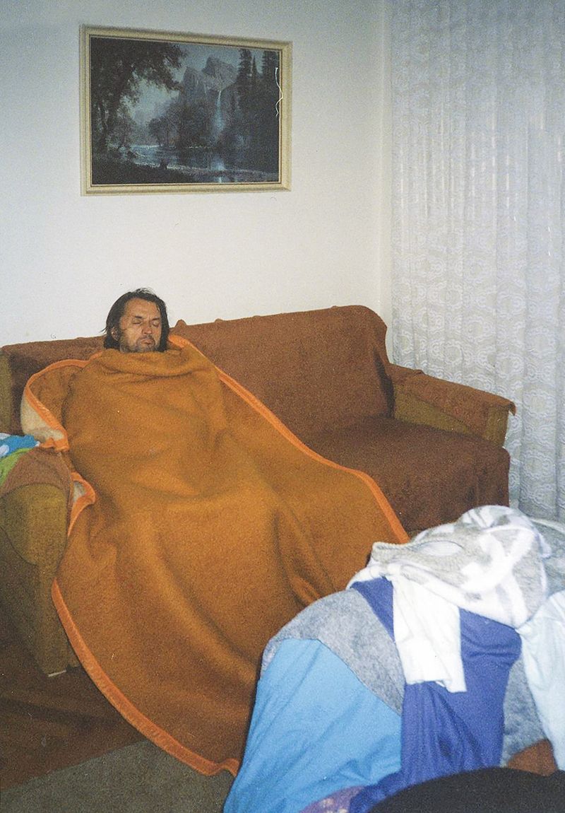 © Lucija Rosc - An archival picture of my grandfather sleeping on the couch.