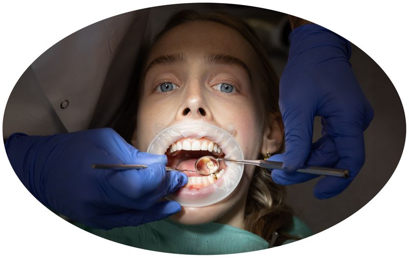 © Lucija Rosc - Emblem, 2023. This picture was taken right after they installed grandma's melted golden veneer into my mouth.