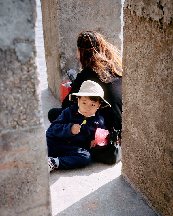 © Chung-wai Wong - A little boy with his Filipino Maid.