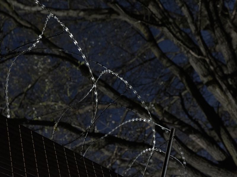 © Matteo Trevisan - The barbed wire surrounding the San Didero construction site. March 2022, Val di Susa, Turin, Italy