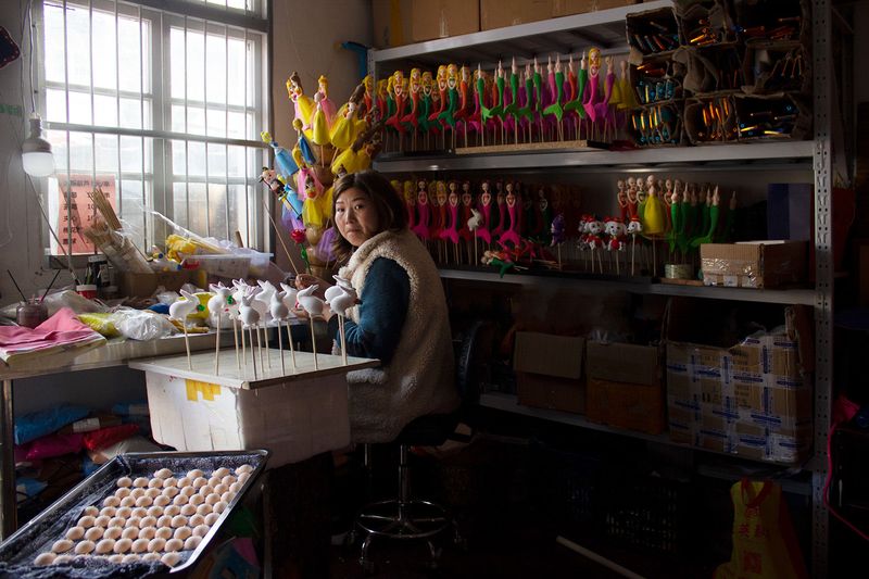 © Sijia Ma - Mother in her sweet shop at Huaxia Town, Jiaxing City.