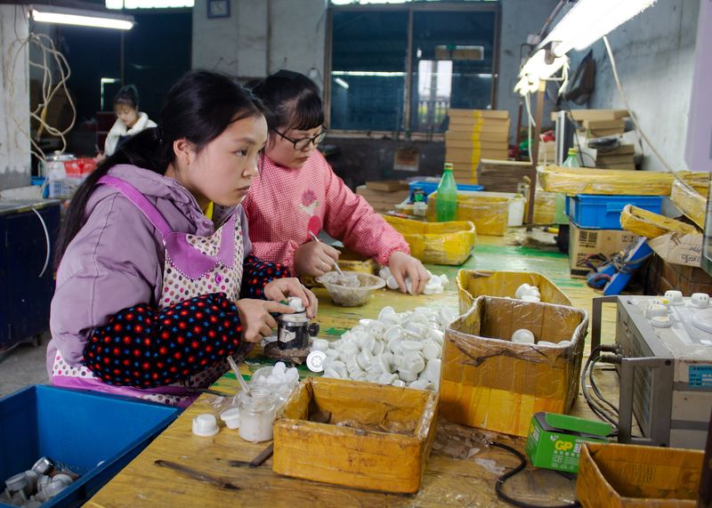 © Sijia Ma - Young sister Yulian working as technical manufacture workers in Huahe town.