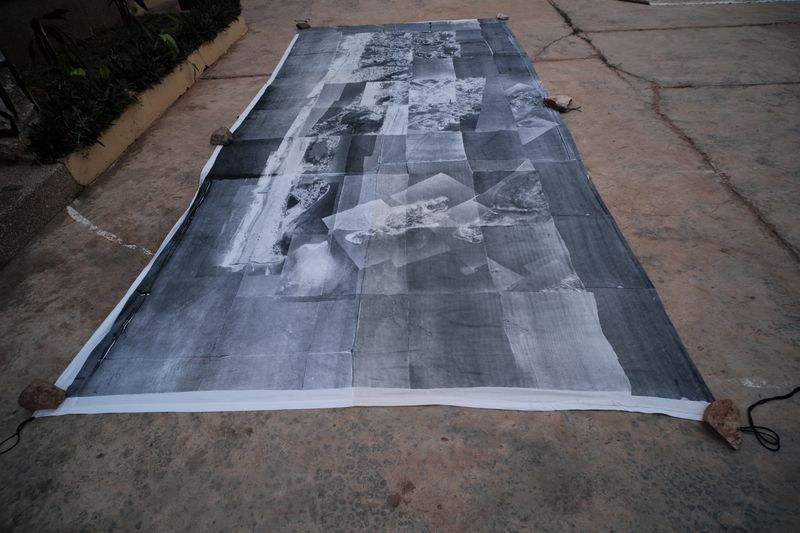 © Ofoe Amegavie - Curatorial concept 18x8inches size Abala with drone image of current state Ada screen printed on it. 2022