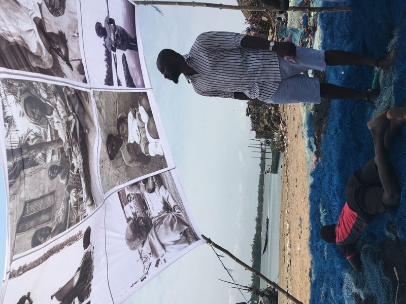 © Ofoe Amegavie - Curatorial concept, Viewing photos printed on a sample Abala. 2019