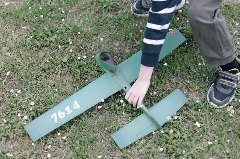 © Filippo Venturi - My son Ulisse playing in the park with my father's model aircraft. April 20, 2024.