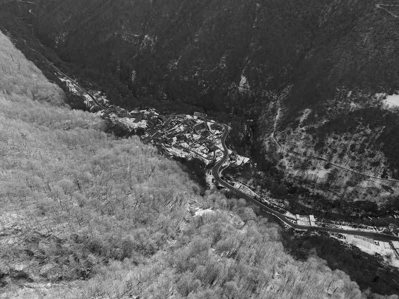 © Filippo Venturi - The village of Viganella beneath the shadow line created by the natural barrier of the valley. Viganella, 2026.