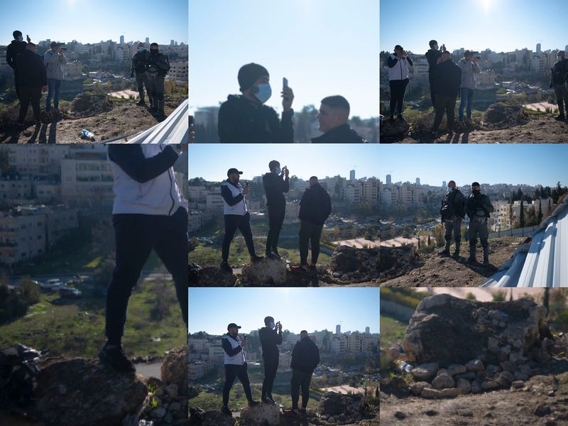 © Edith Geuppert - Young Palestinians filming Israeli soldiers during an home eviction in the East Jerusalem neighborhood Sheikh Jarrah.