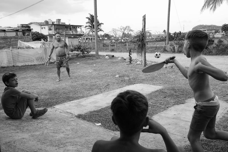 © Valentine Ollawa - Playing tennis with his sons