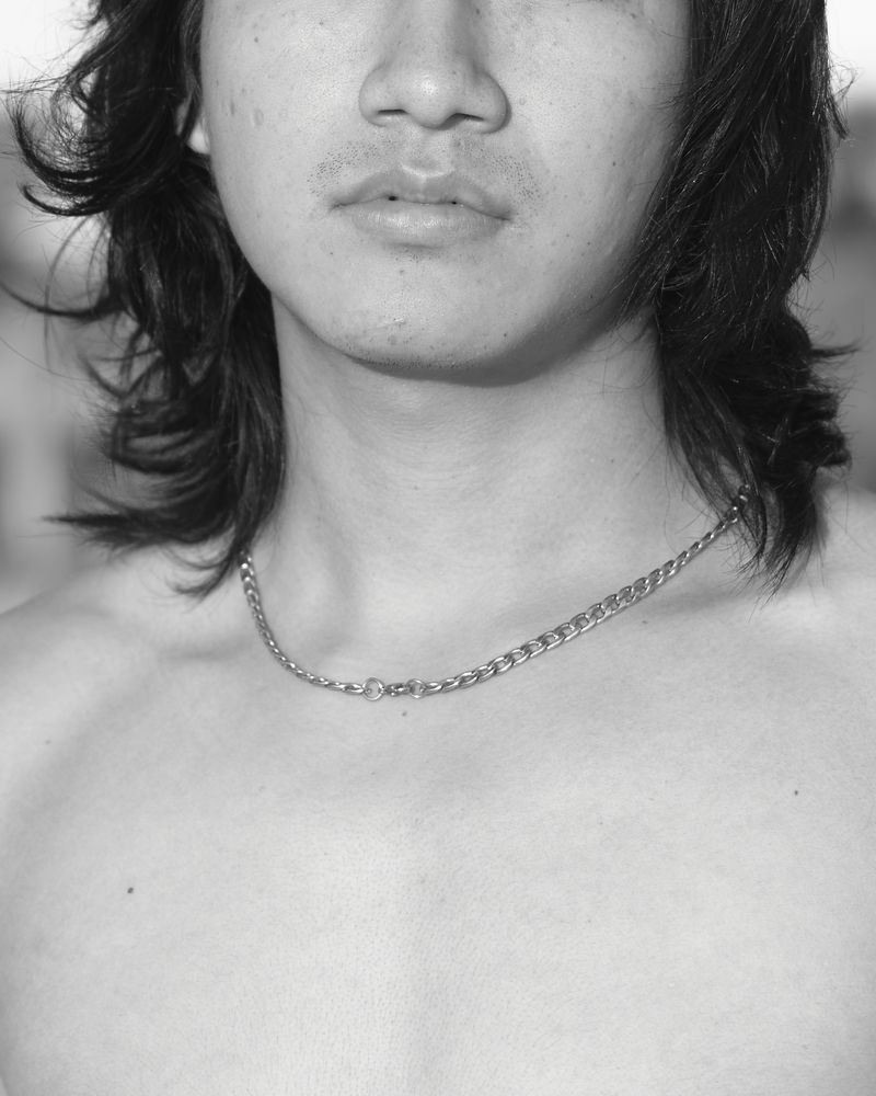 © YANG YANG - Portrait of young man.