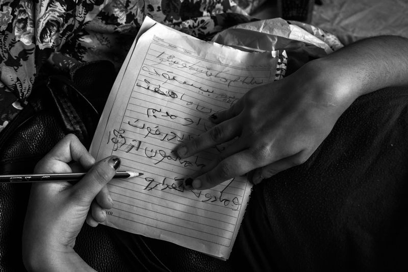 © Azadeh Besharati - This is Shiva's handwriting. They made the decision to drop out of school.