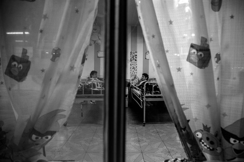 © Azadeh Besharati - Shima and Shiva at the Rasht Nursing House, the place where they were living there more than a decade.