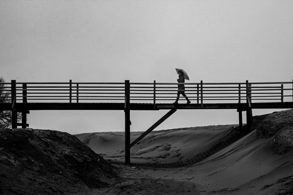 © Javier Gogna - FRAGILE PASSAGE Under the umbrella, something still holds.