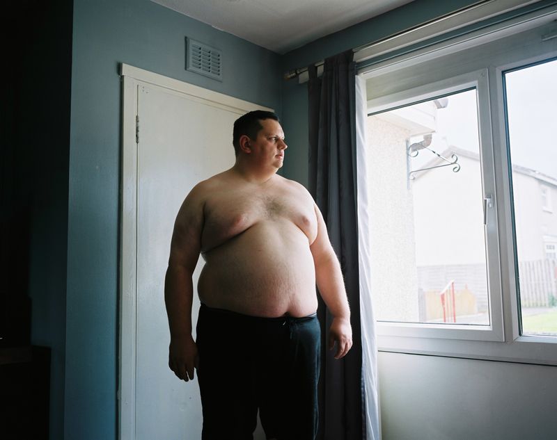 © Kirsty Mackay - David, at home in Bellshill, Glasgow.