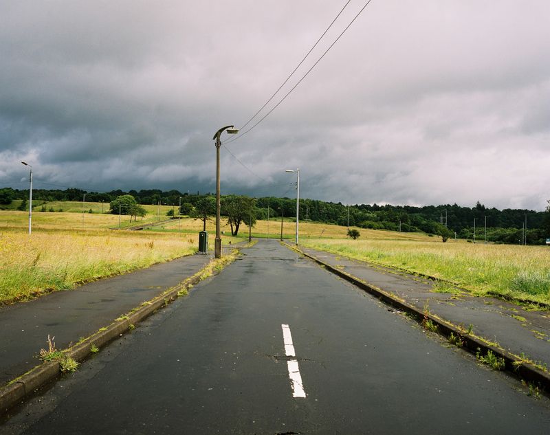 © Kirsty Mackay - Blackcraig Avenue, Drumchapel, street lamps still standing after streets full of houses have been demolished.