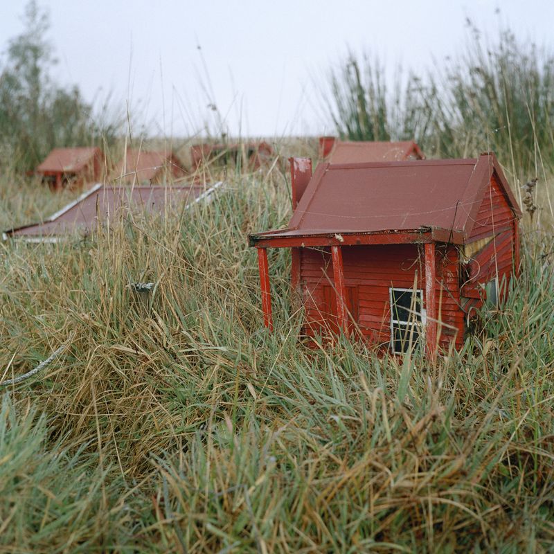 © Caroline McQuarrie - Waiuta Model Village #15. The red huts, single men’s quarters. 2013.