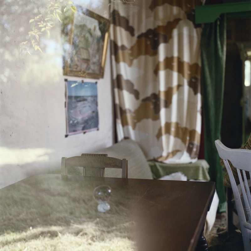 © Caroline McQuarrie - Reflection in the window of former residence of Joseph Divis, photographer and miner (uninhabited), Waiuta, 2011.