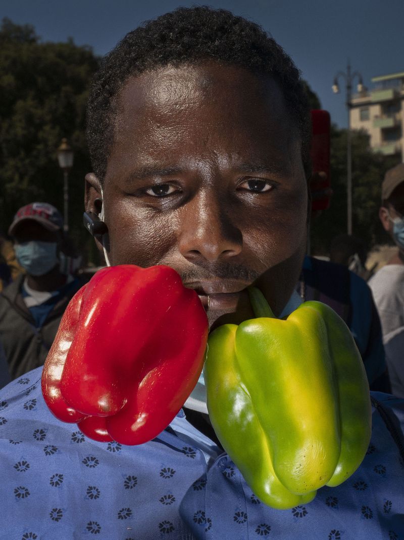 © LUCA SANTESE - Luca Santese & Marco P. Valli - Realpolitik 2018-2023. Protester against agricultural gangmastering.