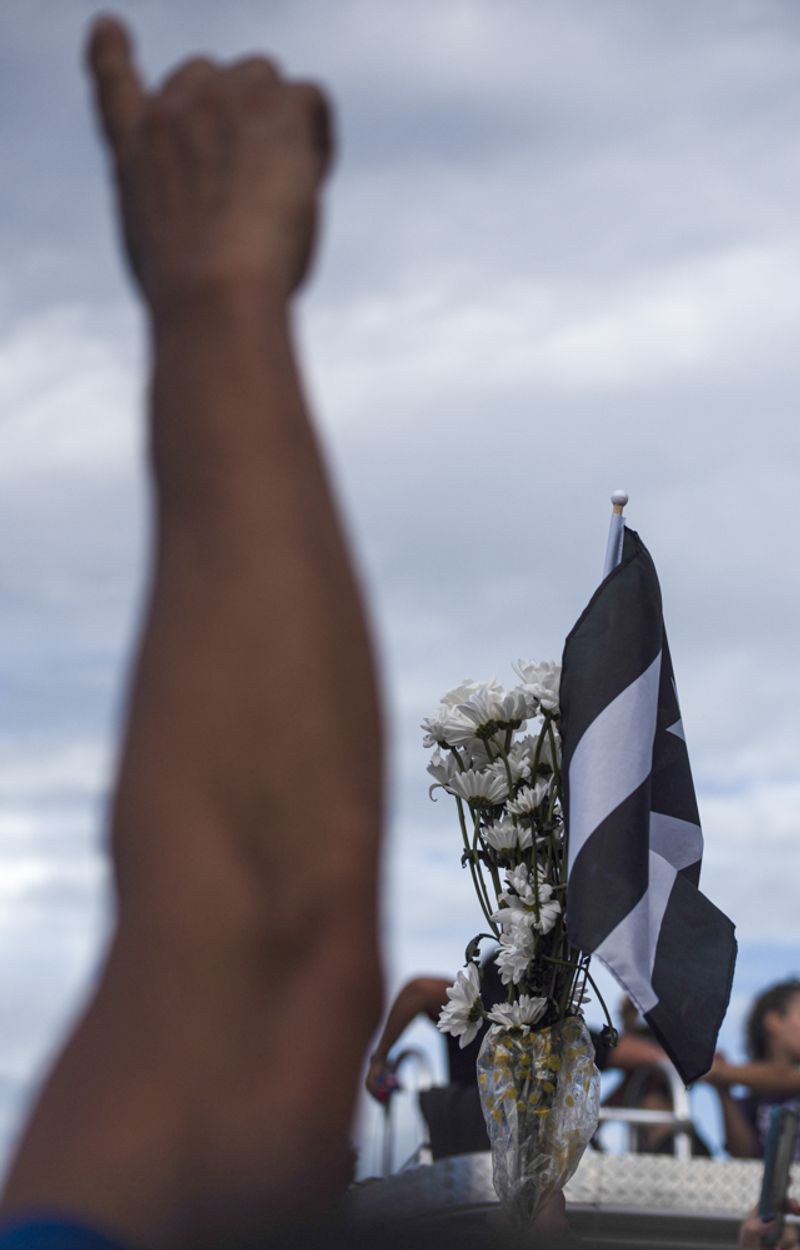 © Sally Rodriguez - Flowers and a Flag