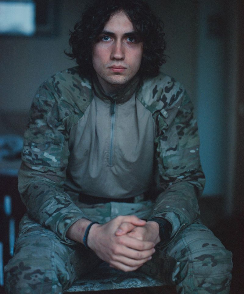 © lucile brizard - Danylo, just off the train from eastern Ukraine, arrives in his fatigues. Kyiv, Ukraine, 2025.
