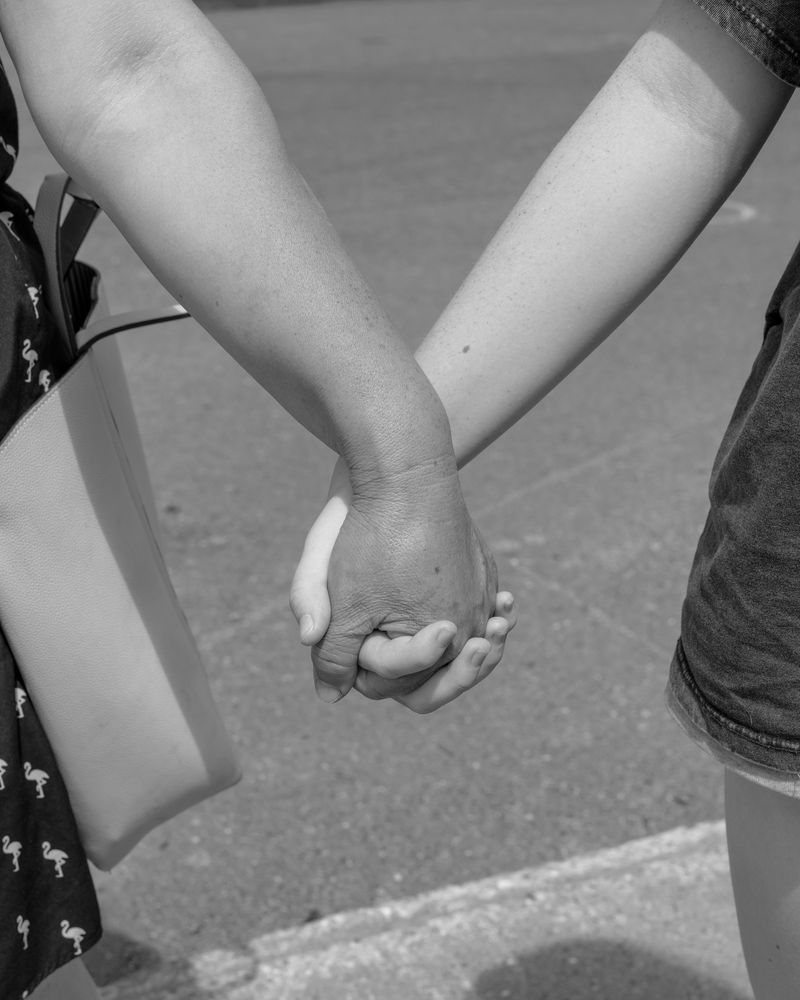 © Michael Valiquette - "Mother and Daughter Holding Hands"