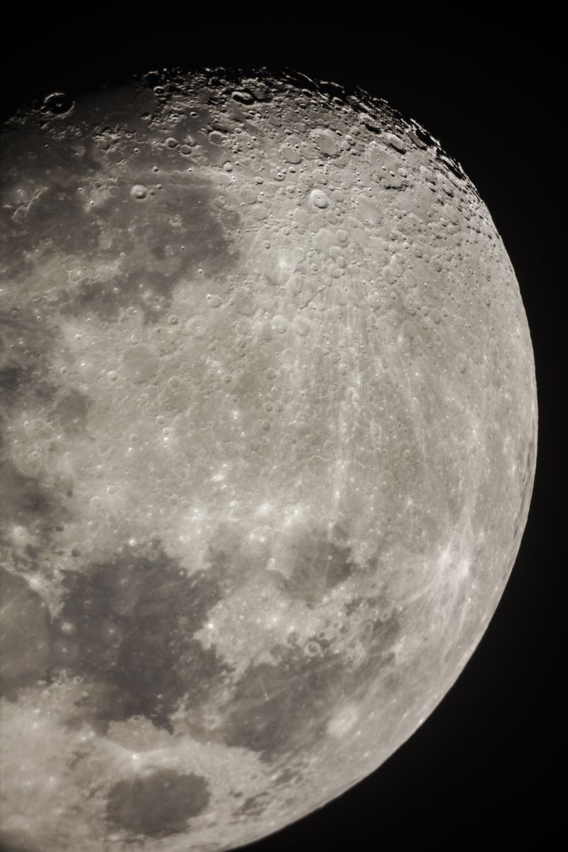 © Robert Ormerod - Craters mark the moon surface photographed using a celestron telescope, in Sutherland South Africa