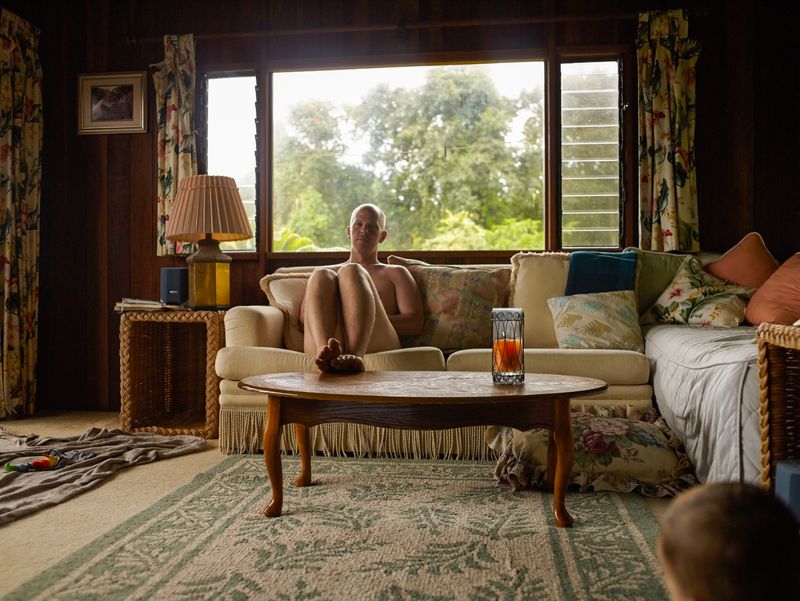 © Eri Morita - The owner was mowing the yard naked at the nudist guesthouse in Maui.