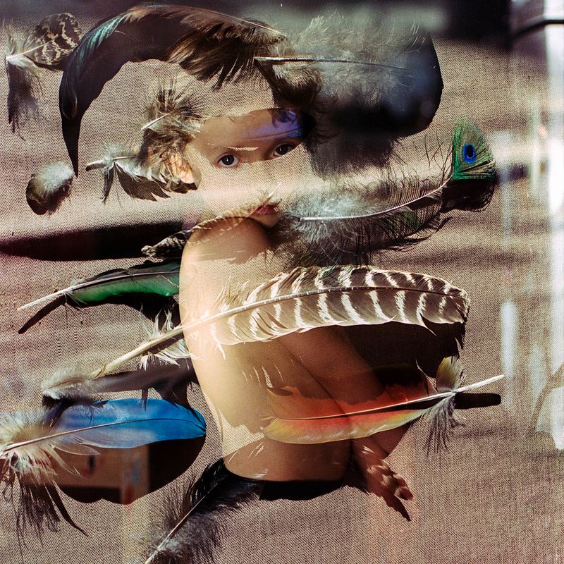 © María García - My son Seydú and his collection of feathers.