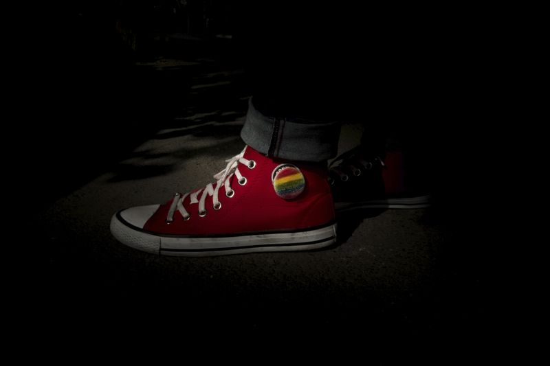 © URA ITURRALDE - Ari has the colours of the LGBT flag stitched onto his shoes.