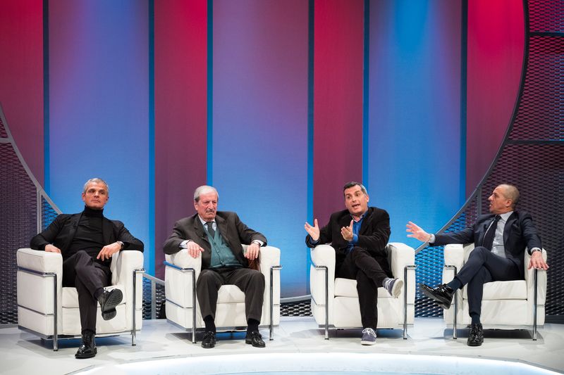 © Franziska Gilli - Studio guests converse on the football talk show "Il processo di Biscardi".
