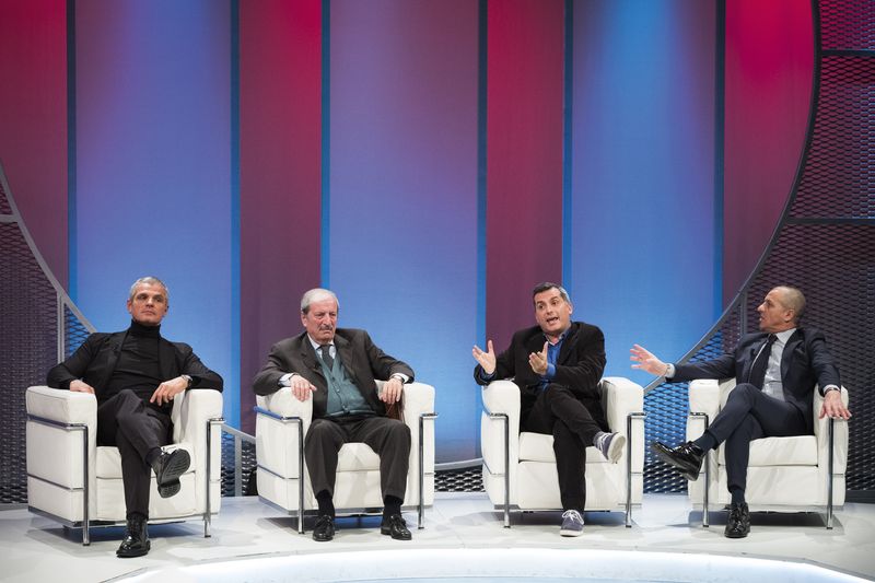 © Franziska Gilli - Studio guests converse on the football talk show "Il processo di Biscardi".