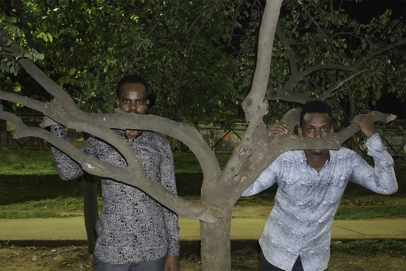 © Min Ma Naing - Somalian students enjoy their time at Dhamondi lake after their evening class, in Dhaka Bangladesh on 23rd April 2018.