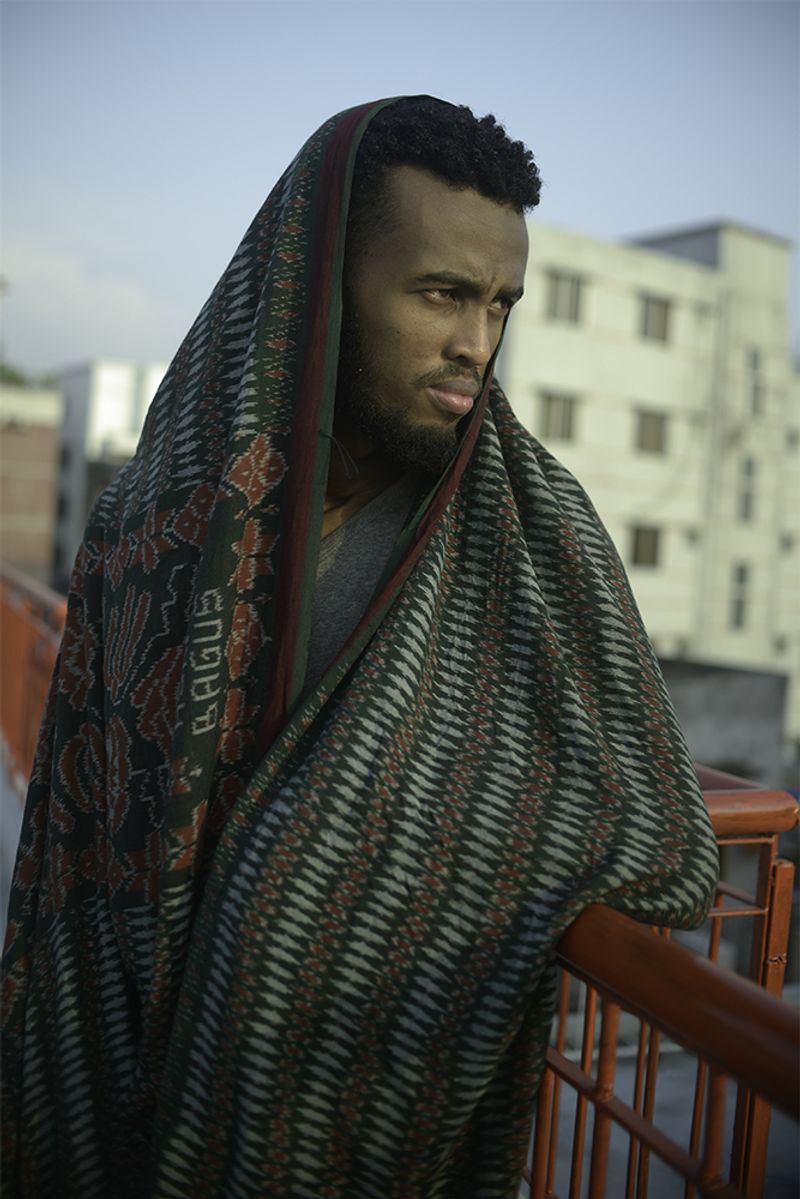 © Min Ma Naing - Abdullah posts for the portrait at the rooftop of his apartment in Dhaka, Bangladesh, on 19th April, 2018.