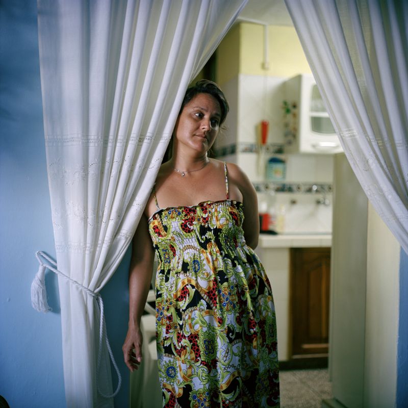 © Michael Vince Kim - Sandra, a Cuban-Korean at her home in Matanzas. Matanzas, Cuba. 2016.
