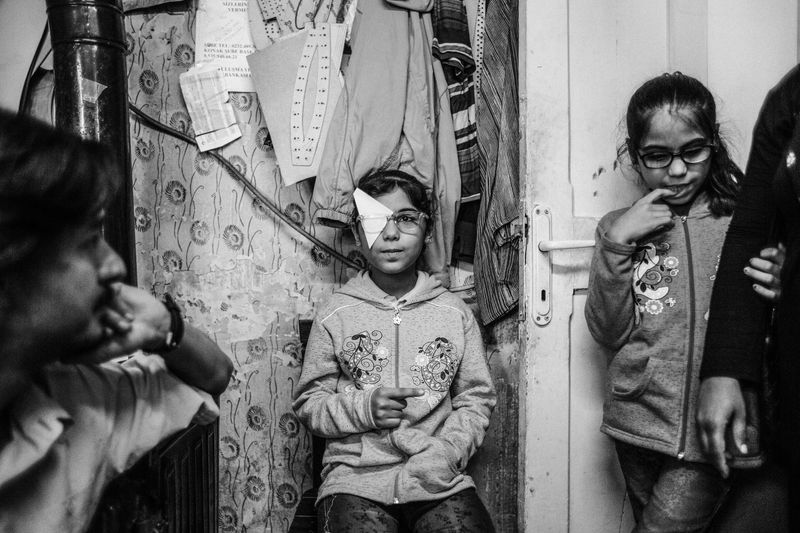 © Emin özmen - Young Syrian refugees being check up by voluntary ophthalmologist in Basmane district in Izmir TURKEY October 2016