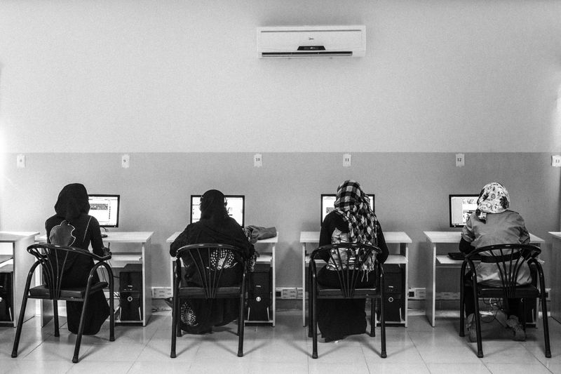 © Emin özmen - Syrian refugees use internet room in Harran refugee camp near Syrian border in Sanliurfa Turkey, August 2013