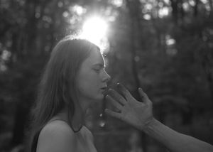 Through touch.