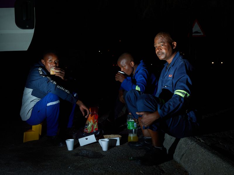 © Anton Bossenbroek - Truck drivers having dinner, Secunda old mall, 2024