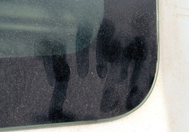 © Matteo Falcone - Fingerprints on the minivan.