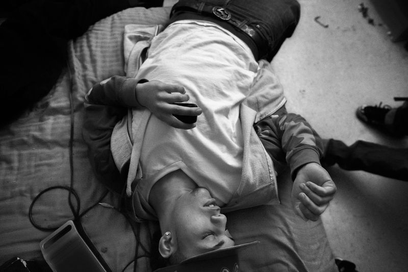 © Nicolas Enriquez - “Flash” after smoking marijuana, one of the things that Latin Kings do the most is hang out and smoke.