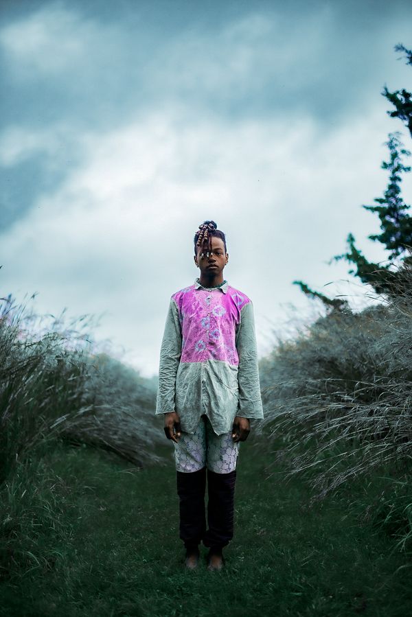 © Sabine Ostinvil - Tender defiance, standing still in the rain.