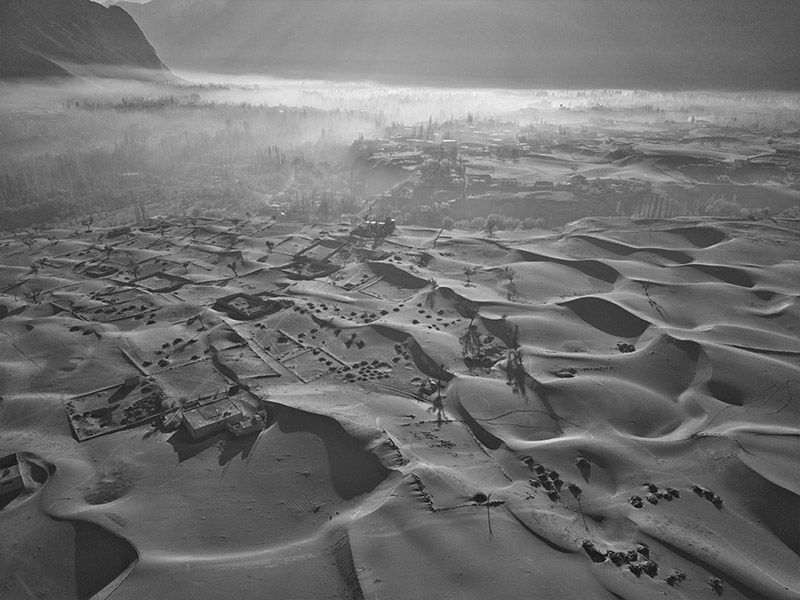 © Asmar Photography - Mass construction in desert