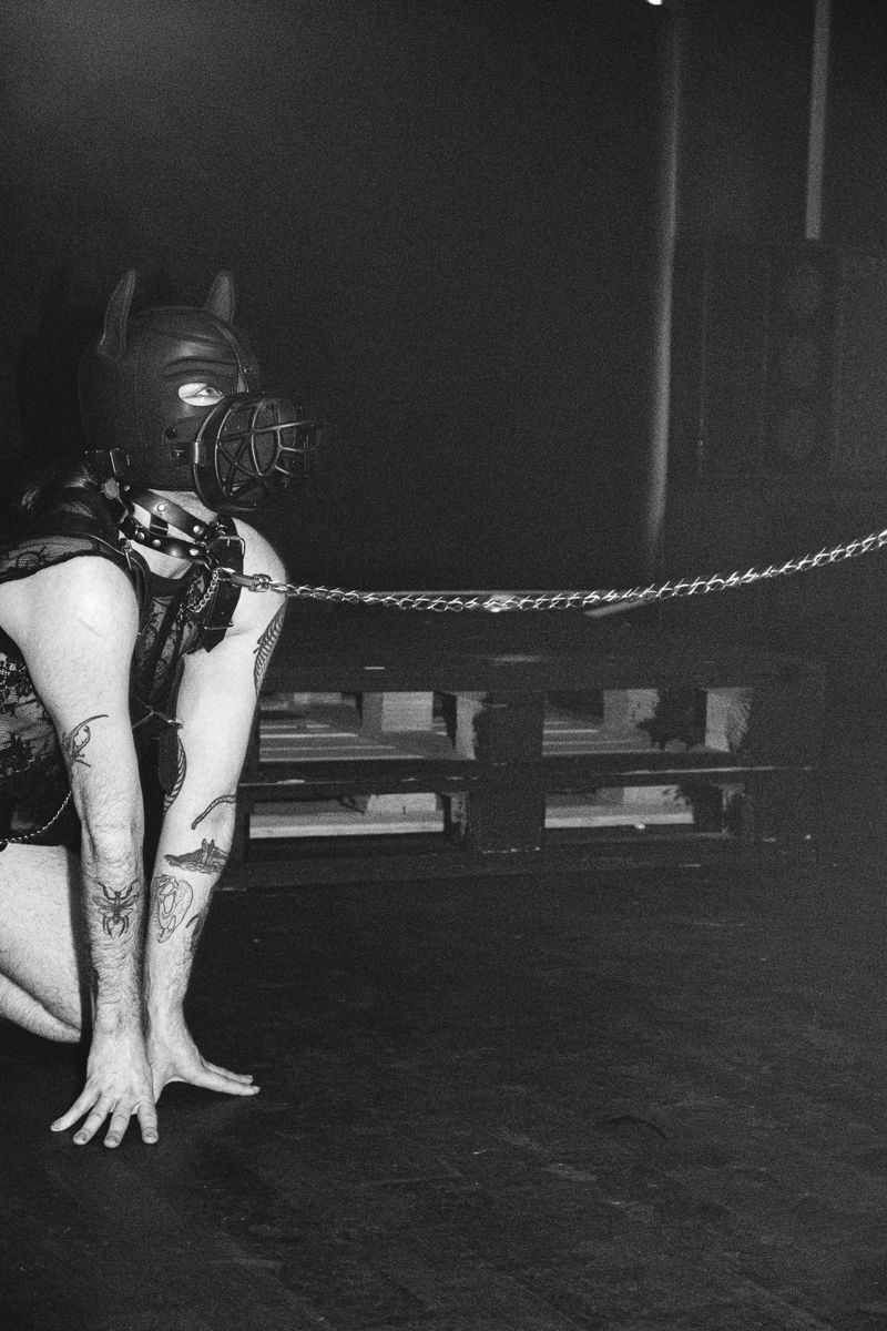 © Nadia Ettwein - Pup on a leach, 2024. Portrait with dog mask. Pup play is a sexual kink.