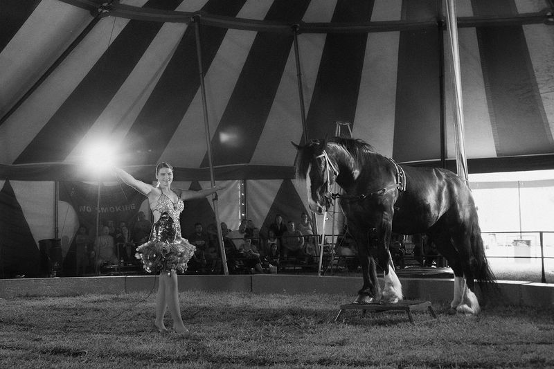 © Lieh Sugai - Miss Paulina at her "Big & Little" show. She also performs in a unicycle act with her family as the Arlise Troupe.