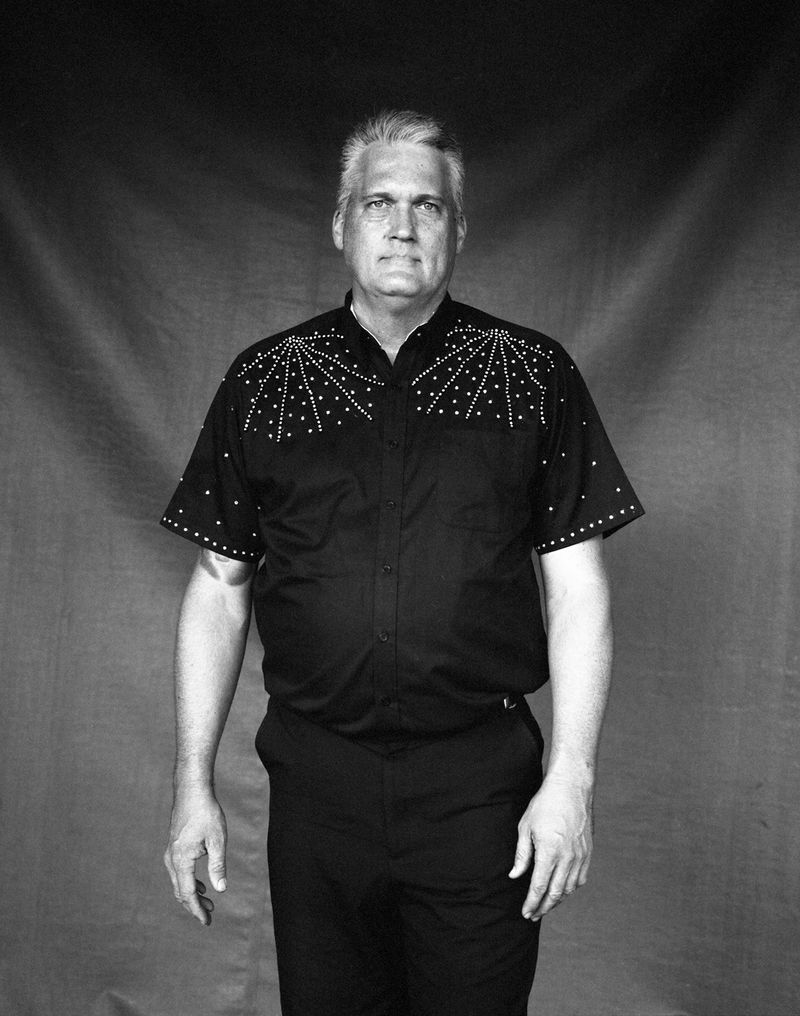 © Lieh Sugai - Owner and big cat trainer Trey Key poses for a portrait outside the tent.