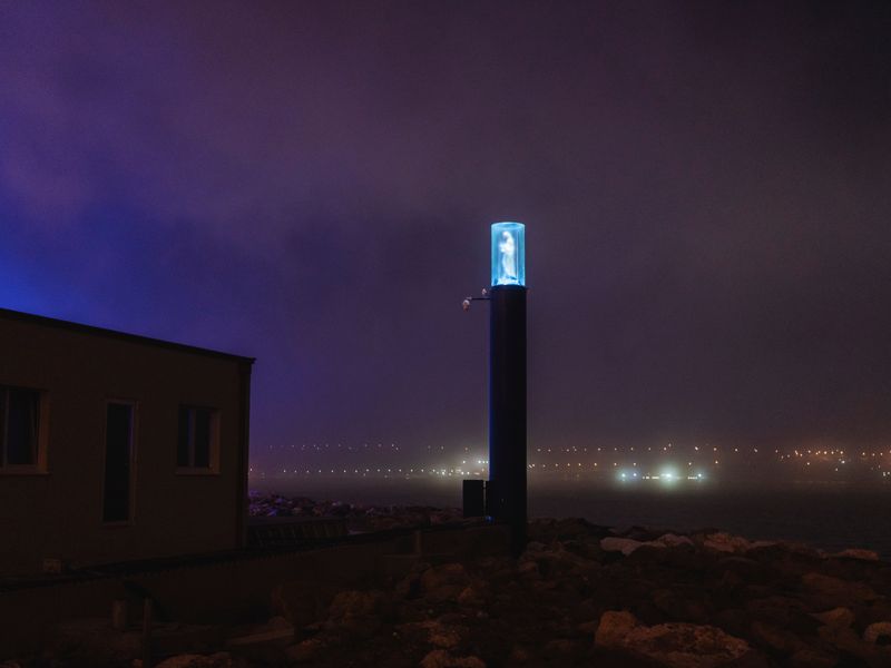 © Sebastian Wells - A Madonna shines at a yacht port. Augusta, December 2019.