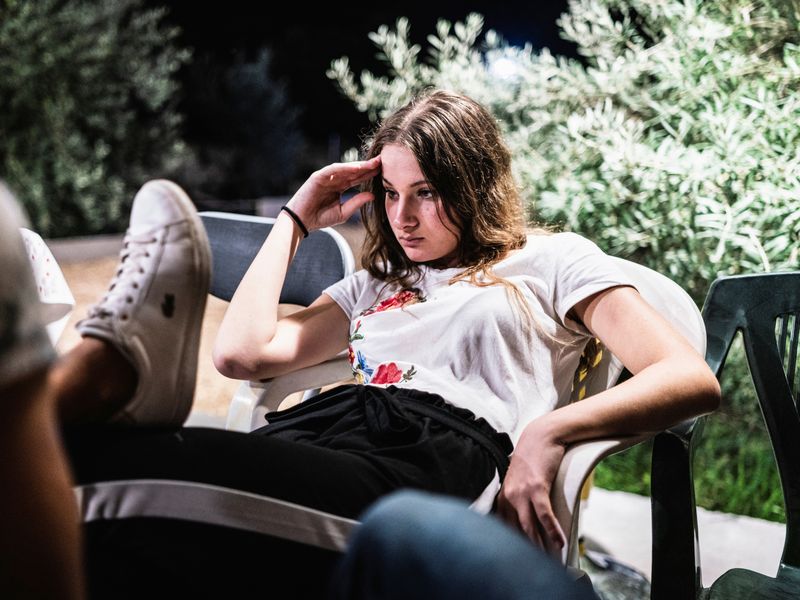 © Sebastian Wells - Helena looks into nothing during the 18th birthday of her boyfriend Gaetano. Villasmundo, September 2019.