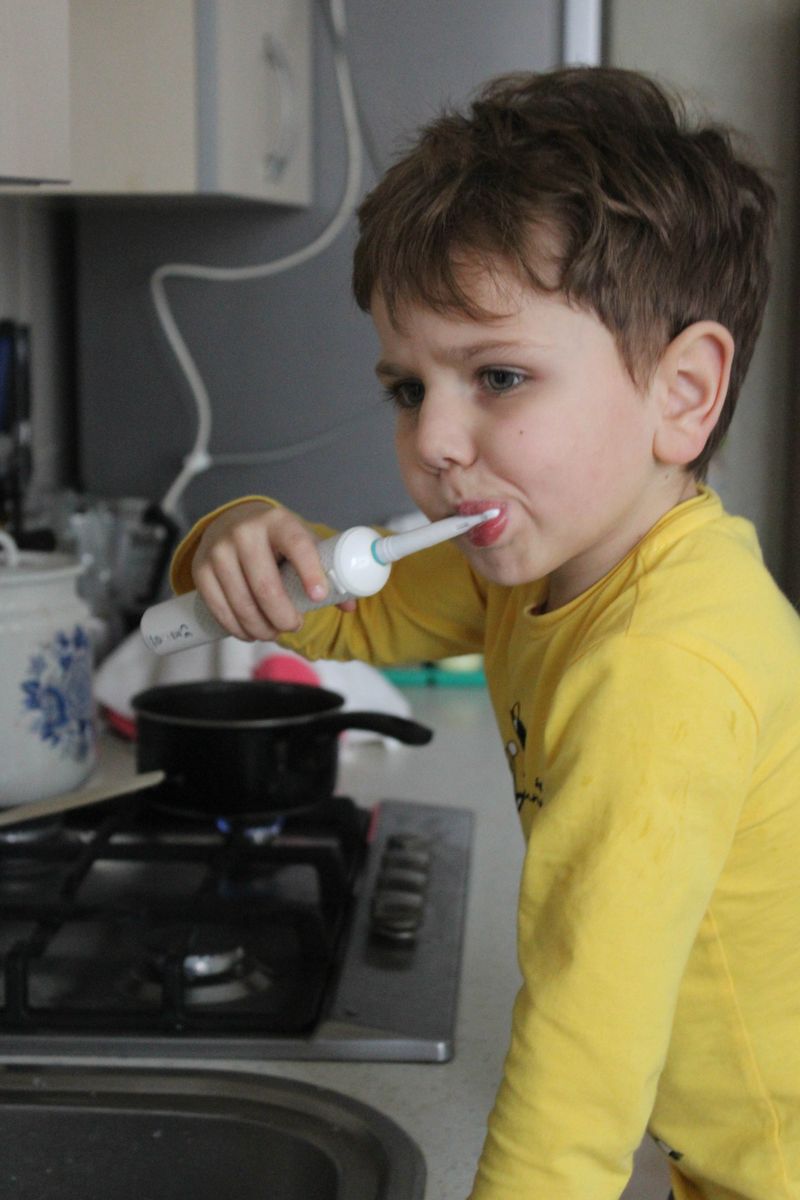 © Ira Sozanska - My son brushes his teeth during an unstable morning. Routine becomes a way of preserving normality and safety for children.